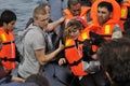 LESVOS, GREECE october 20, 2015: Refugees arriving in Greece in dingy boat from Turkey. Royalty Free Stock Photo