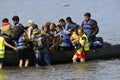 LESVOS, GREECE october 12, 2015: Refugees arriving in Greece in dingy boat from Turkey. Royalty Free Stock Photo