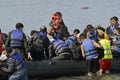 LESVOS, GREECE october 12, 2015: Refugees arriving in Greece in dingy boat from Turkey. Royalty Free Stock Photo