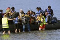 LESVOS, GREECE october 12, 2015: Refugees arriving in Greece in dingy boat from Turkey. Royalty Free Stock Photo