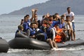 LESVOS, GREECE october 12, 2015: Refugees arriving in Greece in dingy boat from Turkey. Royalty Free Stock Photo