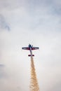 Antidotum Airshow Leszno 2023 and acrobatic shows full of smoke of Ãâ°quipe de Voltige on blue