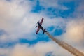 Antidotum Airshow Leszno 2023 and acrobatic shows full of smoke of Ãâ°quipe de Voltige on blue