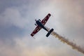 Antidotum Airshow Leszno 2023 and acrobatic shows full of smoke of Ãâ°quipe de Voltige on blue