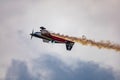 Antidotum Airshow Leszno 2023 and acrobatic shows full of smoke of Ãâ°quipe de Voltige on blue