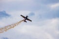 Antidotum Airshow Leszno 2023 and acrobatic shows full of smoke of Ãâ°quipe de Voltige on blue