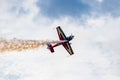 Antidotum Airshow Leszno 2023 and acrobatic shows full of smoke of Ãâ°quipe de Voltige on blue