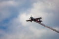 Antidotum Airshow Leszno 2023 and acrobatic shows full of smoke of Ãâ°quipe de Voltige on blue