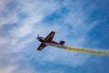 Antidotum Airshow Leszno 2023 and acrobatic shows full of smoke of Ãâ°quipe de Voltige on blue