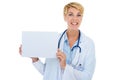 Let her endorse your text. A young female doctor holding up a blank placard.