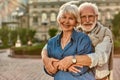 Let the love last forever. Happy senior couple bonding to each other and smiling while sitting on the park bench Royalty Free Stock Photo