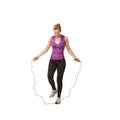 Let me just step over this. An attractive young woman having some difficulty with the skipping rope. Royalty Free Stock Photo