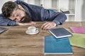 Let me relax. Man sleeping over workplace. coffee will help me. bored and exhausted guy sleep at work. need break for Royalty Free Stock Photo