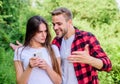 Let me see. couple in love. Blogging concept. man pry phone of girl in park. Jealousy. personal space concept. Got lost Royalty Free Stock Photo