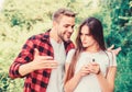 Let me see. couple in love. Blogging concept. man pry phone of girl in park. Jealousy. personal space concept. Got lost Royalty Free Stock Photo