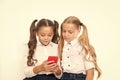 Let me show you something interesting. Educational application. Online entertainment concept. Schoolgirls cute pupils