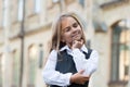 Let me think. Little kid lost in thoughts outdoors. Thoughtful look of small girl. Personal learning and thinking skills Royalty Free Stock Photo