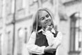 Let me think. Little kid lost in thoughts outdoors. Thoughtful look of small girl. Personal learning and thinking skills Royalty Free Stock Photo