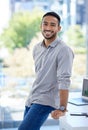 Let no one discourage your ambitions. Portrait of a confident young businessman standing in an office. Royalty Free Stock Photo