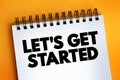 Let`s Get Started text on notepad, concept background