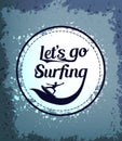 Let's Go Surfing Circle Icon with Surfer in a Grungy Background Royalty Free Stock Photo