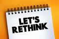 Let`s Rethink text on notepad, concept background Royalty Free Stock Photo