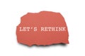 LET`S RETHINK word written under torn paper. Royalty Free Stock Photo