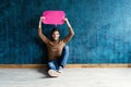 Let`s start a conversation. I speak the language of success. Handsome young man holding up speech bubble on