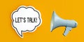 Let\'s talk text message on speech bubble.Megaphone and announcement concept,yellow background Royalty Free Stock Photo
