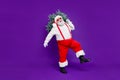 Let it snow. Full length photo of funny fat santa father holding x-mas tree on shoulder wanna make perfect eve wear sun