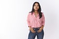 Let talk business language. Portrait of good-looking confident and stylish young 20s woman in striped blouse holding Royalty Free Stock Photo