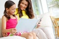 Let your mind get lost within the words. A mother and daughter reading a book together and sharing a bonding moment. Royalty Free Stock Photo