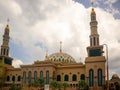 Samarinda Islamic Center Mosque with bright blue and cloudy skies in East Kalimantan, Indonesia Royalty Free Stock Photo