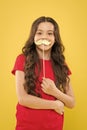 Lets be funny. party elements. happy childhood. small kid yellow background. cheerful child with beautiful long hair Royalty Free Stock Photo