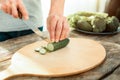 Natural cucumber being cutting.