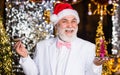 Lets celebrate. christmas menu. bearded man santa hat open tray. main course for xmas. corporate new year party