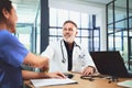 Lets collaborate and continue to save lives. doctors shaking hands during a meeting in a hospital. Royalty Free Stock Photo