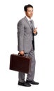 Lets connect. Full-length of a young executive holding a briefcase and pointing at you - isolated.