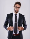 Lets get down to business. Studio shot of a handsome and well-dressed young man. Royalty Free Stock Photo