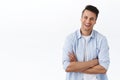 Lets get straight business. Portrait of carefree, relaxed laughing young man, cross arms over chest in ready