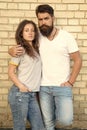 Lets just love together. Couple being in love relations hugging on brick wall. Bearded man and sensual woman enjoying Royalty Free Stock Photo
