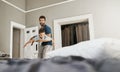 Lets see how far you can fly. Shot of young boy and his father bonding at home. Royalty Free Stock Photo