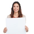 Lets sell your concept together. Portrait of a confident young woman holding a blank white sign in studio. Royalty Free Stock Photo