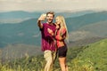 Lets take photo. Capturing beauty. Man and woman posing mobile photo. Couple taking photo. Summer vacation concept Royalty Free Stock Photo