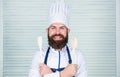 Lets try taste. Add some spices. Man with beard in cook hat and apron hold cooking tools. Cooking as professional Royalty Free Stock Photo