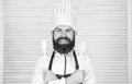 Lets try taste. Add some spices. Man with beard in cook hat and apron hold cooking tools. Cooking as professional Royalty Free Stock Photo