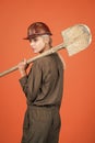 lets work. labor day. woman in boilersuit and helmet. female builder hold shovel.