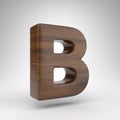 Letter B uppercase on white background. Dark oak 3D letter with brown wood texture. Royalty Free Stock Photo