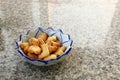 letter biscuits with ceramic bowl on marble table