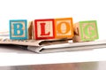 Letter Blocks on Newspapers for a Blog Concept